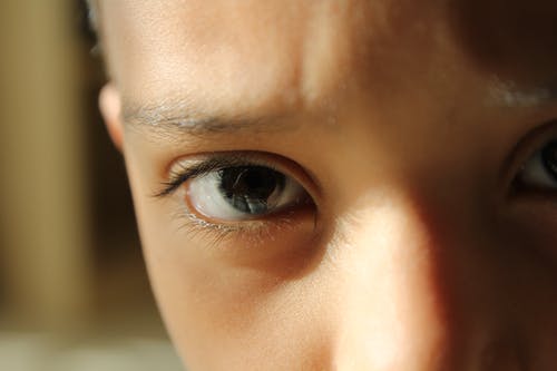 孩子的眼睛的特写照片 · 免费素材图片