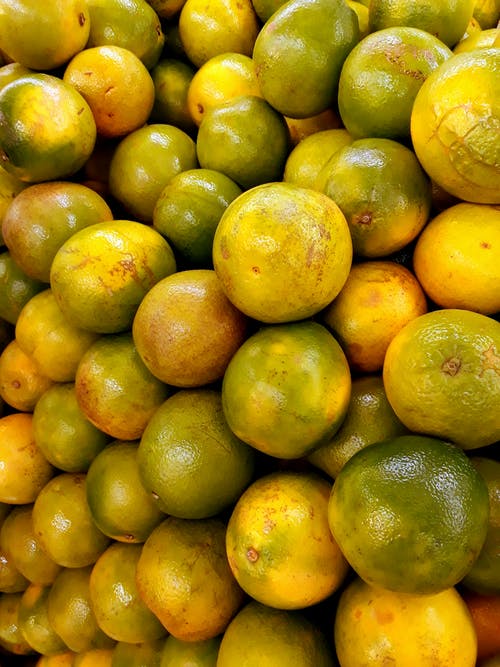 圆形绿色柑橘类水果 · 免费素材图片
