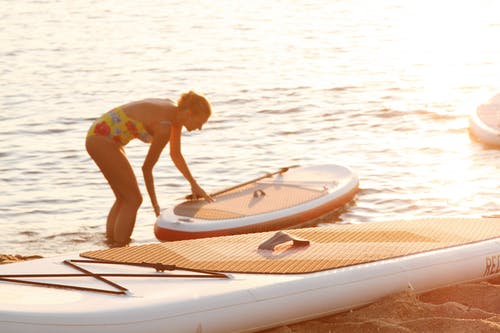 Paddleboard在海边的照片 · 免费素材图片