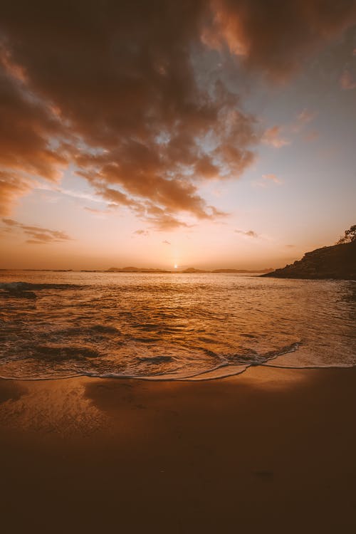 日落期间的海滨风光 · 免费素材图片