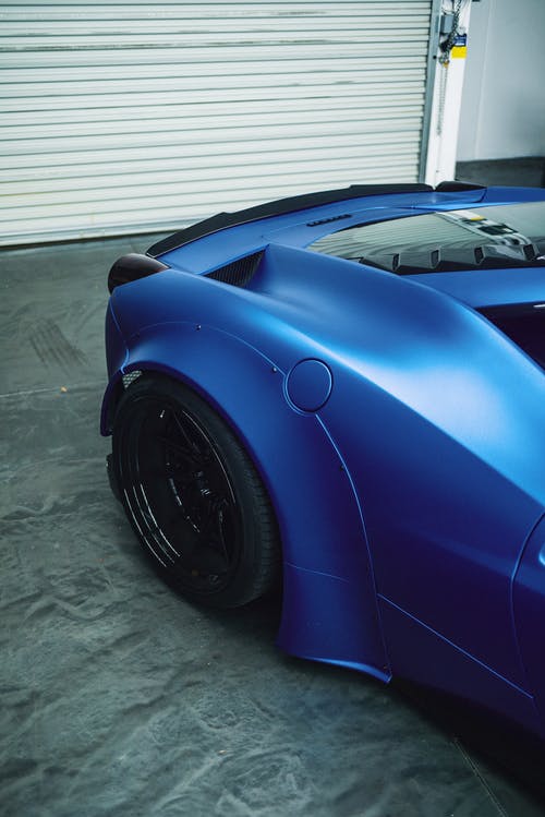 时尚的豪华蓝色跑车的详细信息 · 免费素材图片