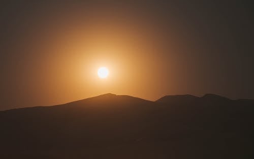 有关剪影, 太阳, 山的免费素材图片