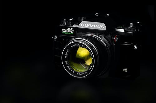 黑色奥林巴斯单反相机 · 免费素材图片