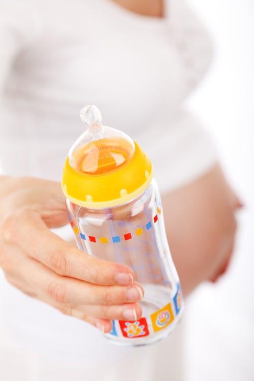 有关女人, 婴儿奶瓶, 孕妇的免费素材图片
