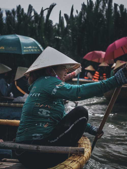 女人控股桨的照片 · 免费素材图片