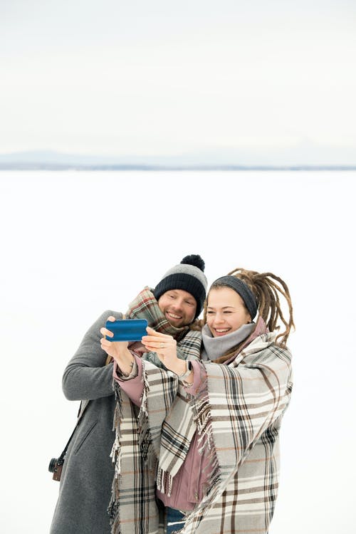 男人和女人以自拍照 · 免费素材图片
