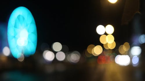 夜间城市照明的焦点外 · 免费素材视频